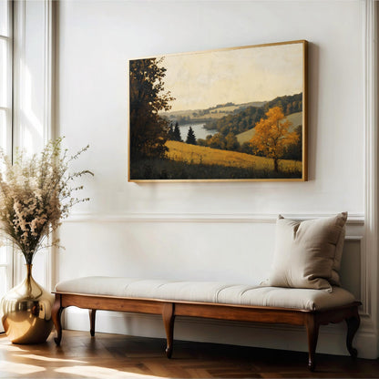 a large landscape painting hanging on a white wall above a wooden bench with a beige cushion. The painting depicts a serene countryside scene with trees, a river, and a field with yellow flowers.