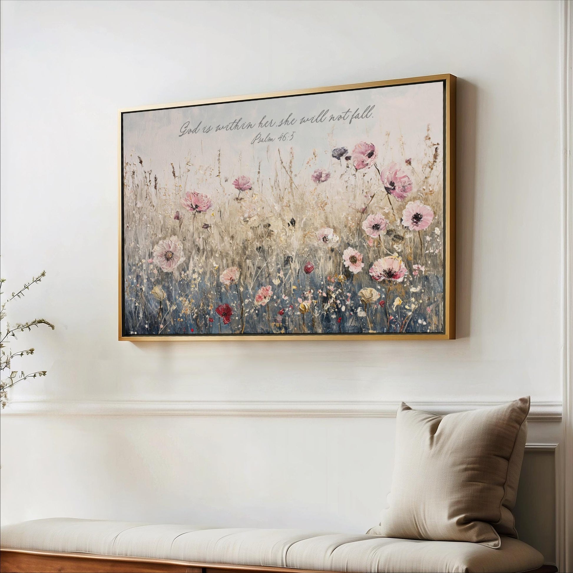 a framed painting of a field of flowers hanging on a wall.