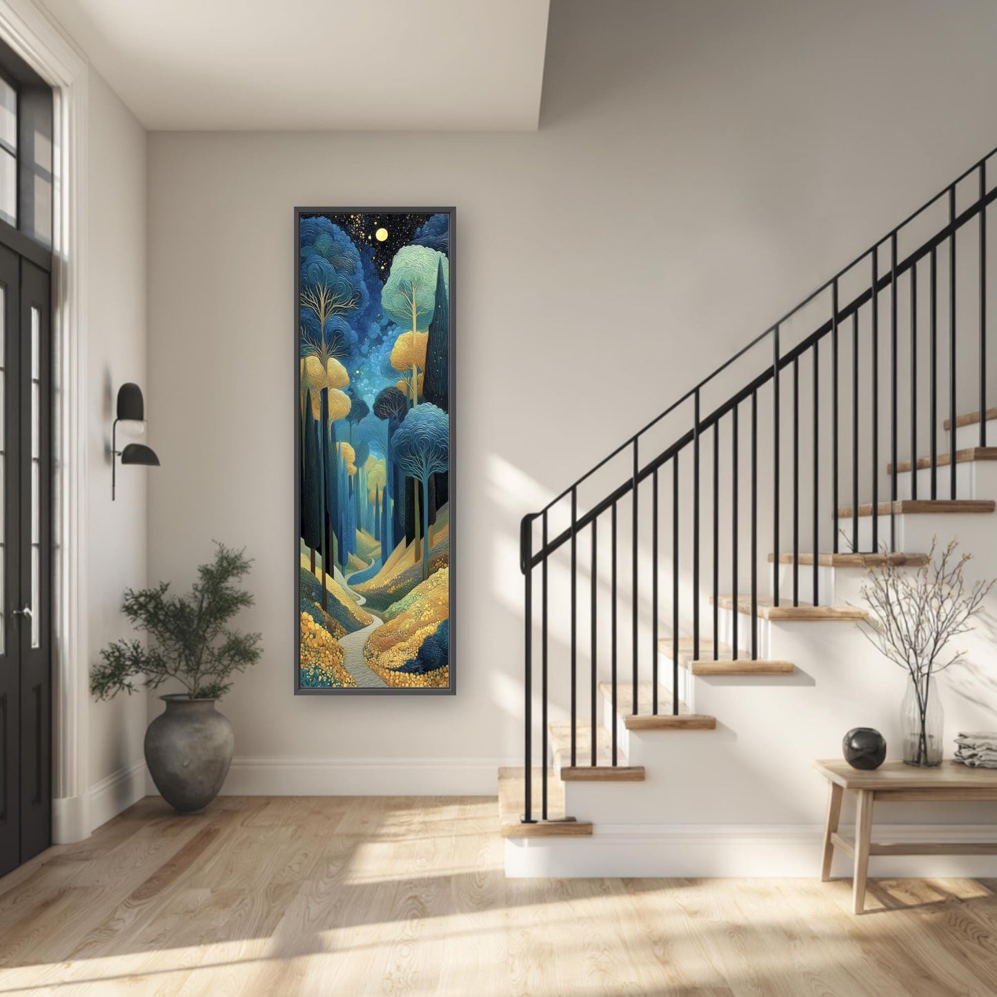 a hallway with a large painting of a forest scene hanging on the wall, a black metal railing, and a wooden staircase.