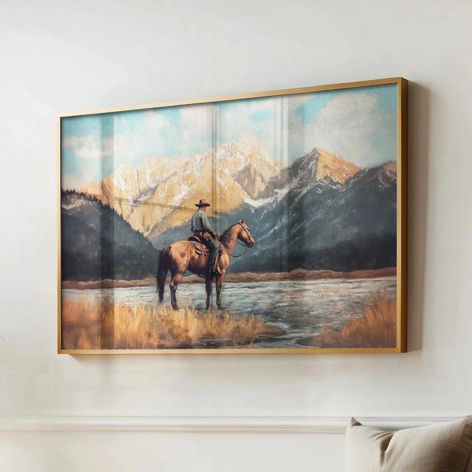 a cowboy riding a horse in a scenic landscape with mountains in the background.