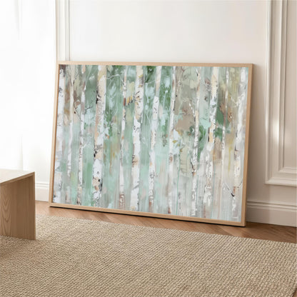 a large, framed painting of a forest scene with tall trees and a lush, green color palette.