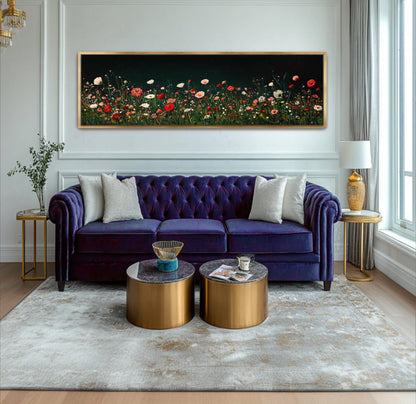 a living room with a purple couch and a painting on the wall