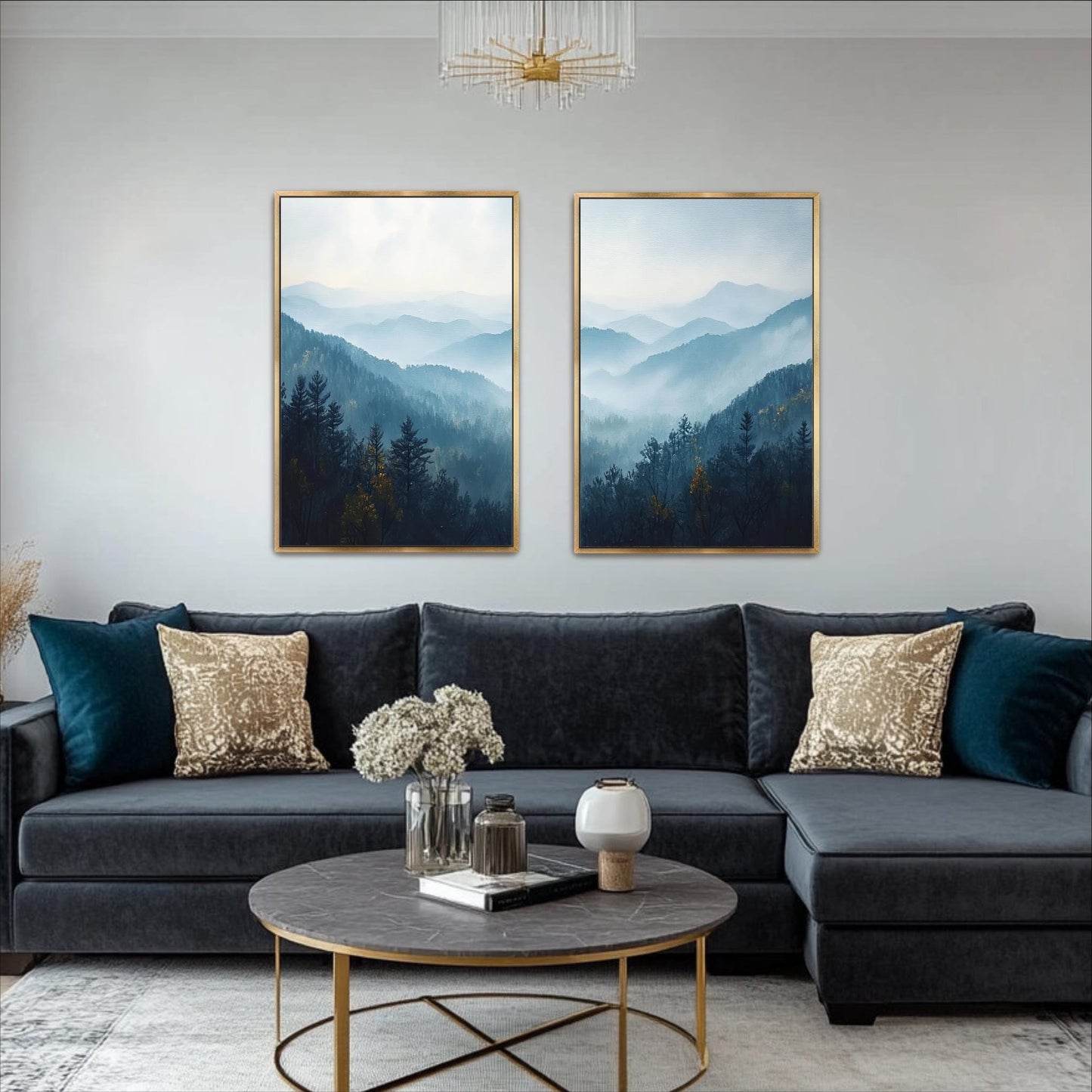 a living room with a gray sectional sofa, two framed landscape paintings on the wall, and a round coffee table in front of the sofa.