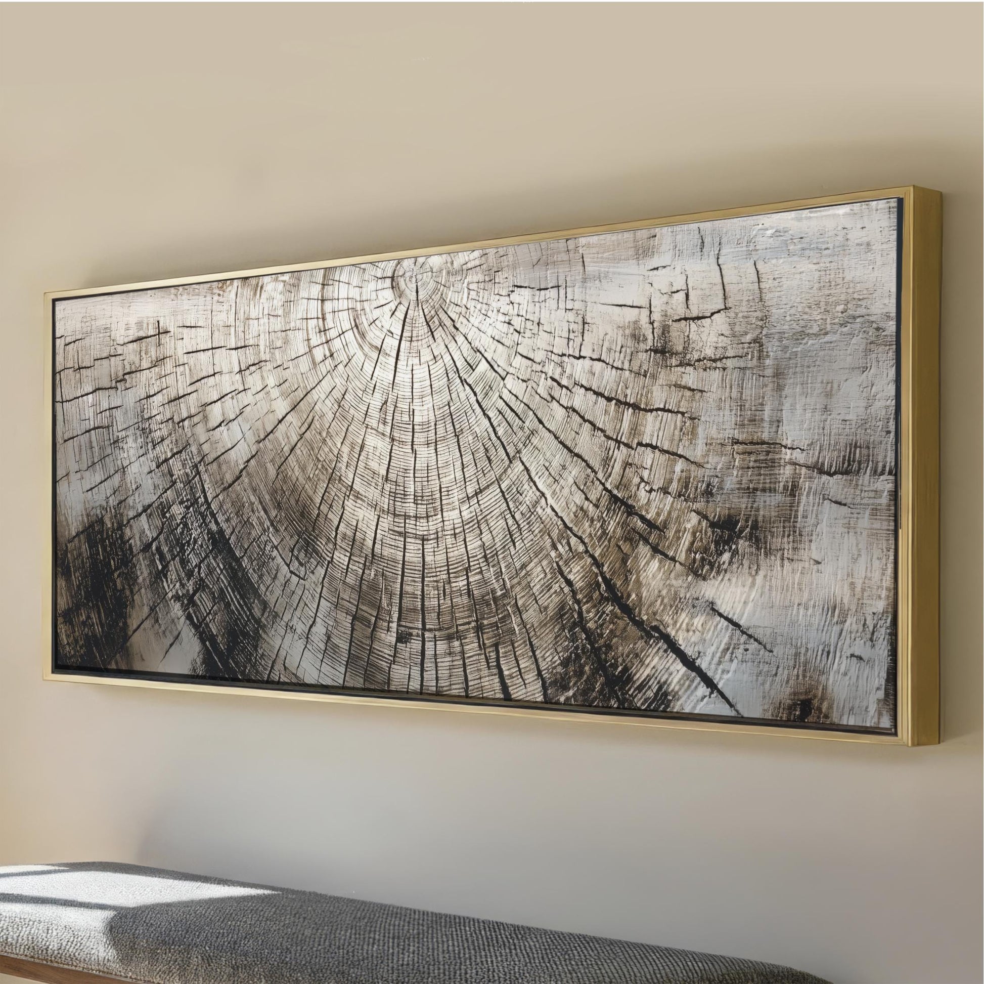 a large, framed artwork depicting a tree trunk with a detailed, textured pattern.