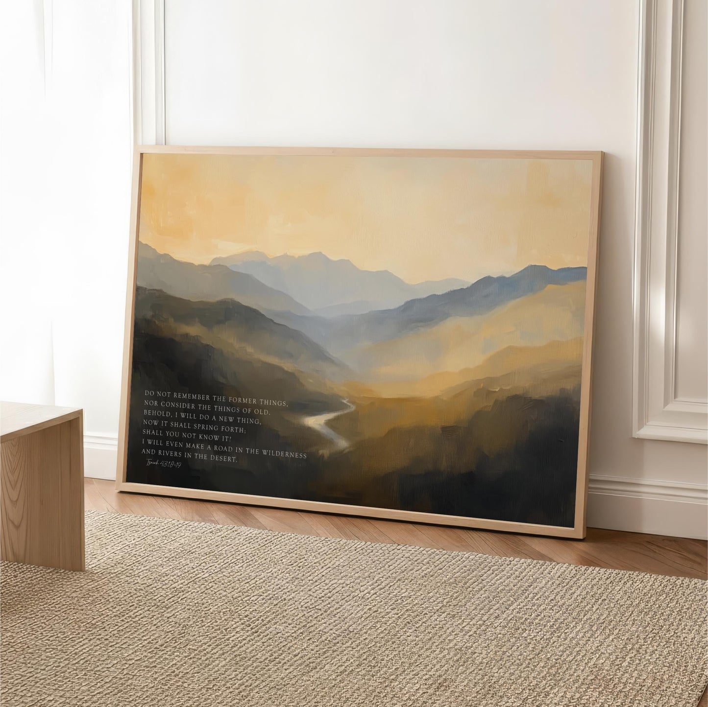 a large landscape painting depicting a mountainous, forested scene with a winding river in the foreground.