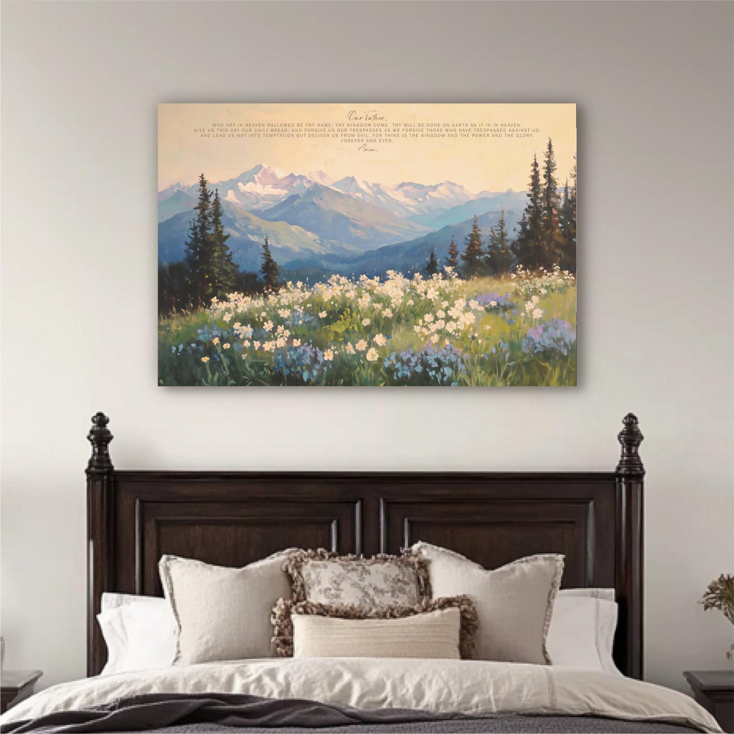 a large painting of a mountain landscape with a field of flowers in the foreground, hanging above a bed with a wooden headboard.