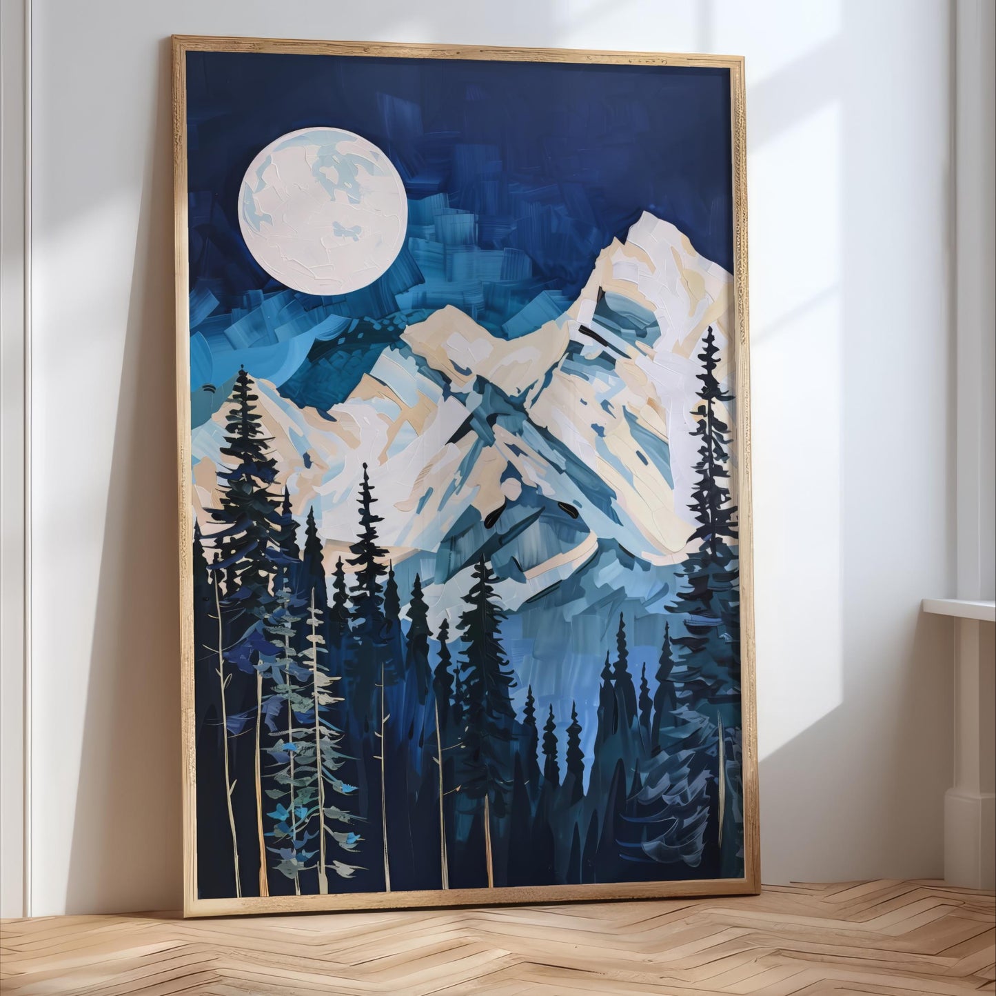 The image is a large framed painting depicting a serene mountain landscape with a full moon in the night sky.