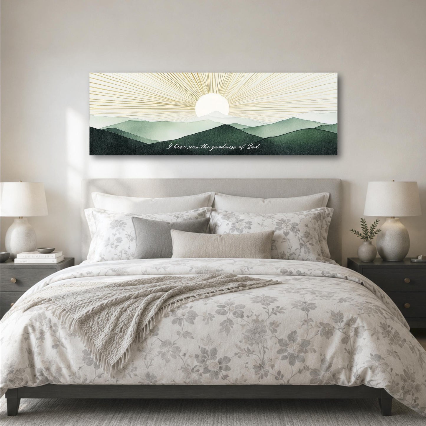 a bedroom with a large bed, a nightstand on each side, and a large wall art print above the bed. The wall art depicts a sunrise over mountains, with the sun appearing to be at the center of the image.