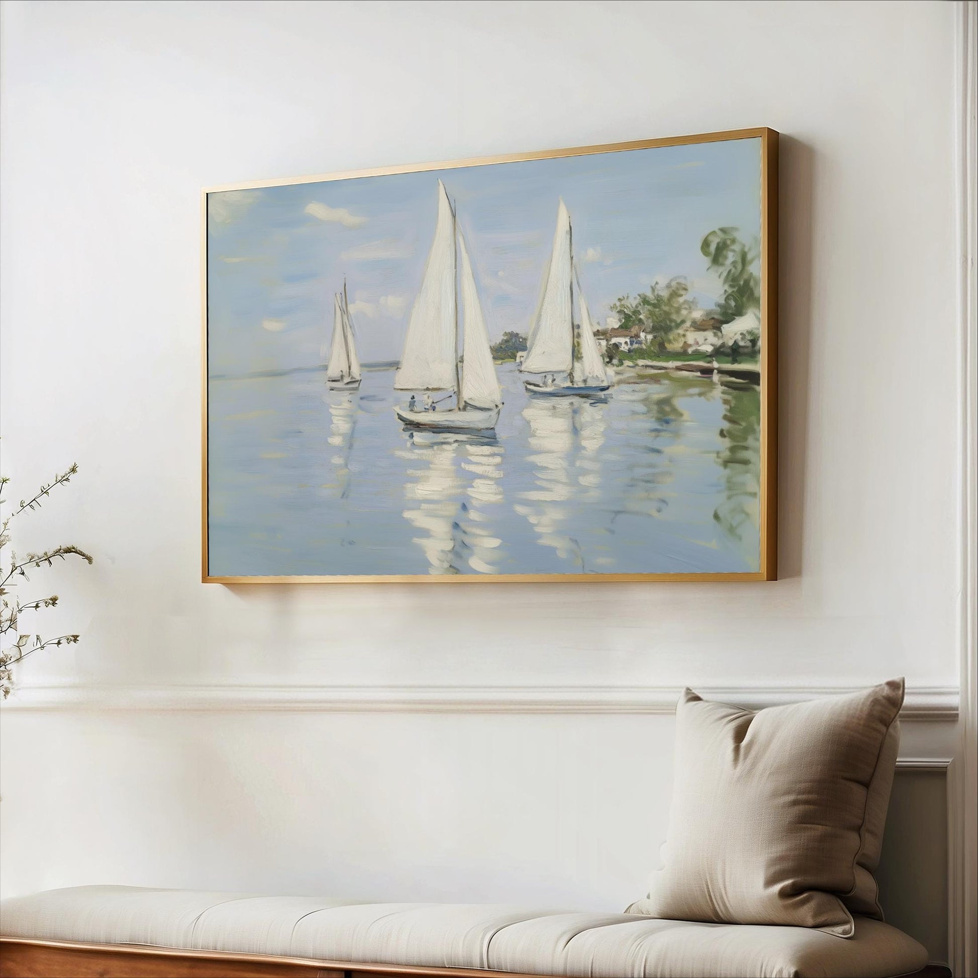 a painting of three sailboats on a body of water, hanging on a white wall above a wooden bench.
