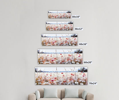 a living room with a couch and three pictures on the wall