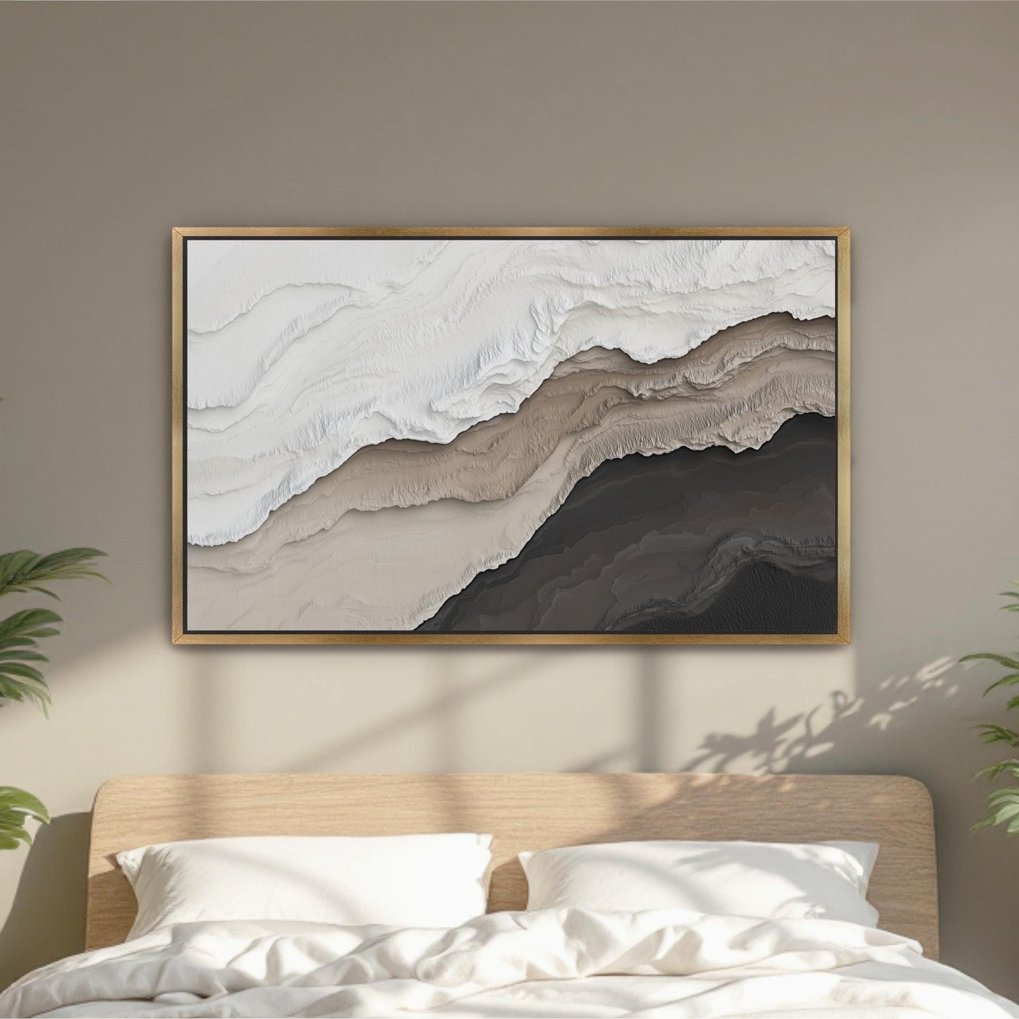a large abstract painting hanging on a wall above a bed with white pillows.