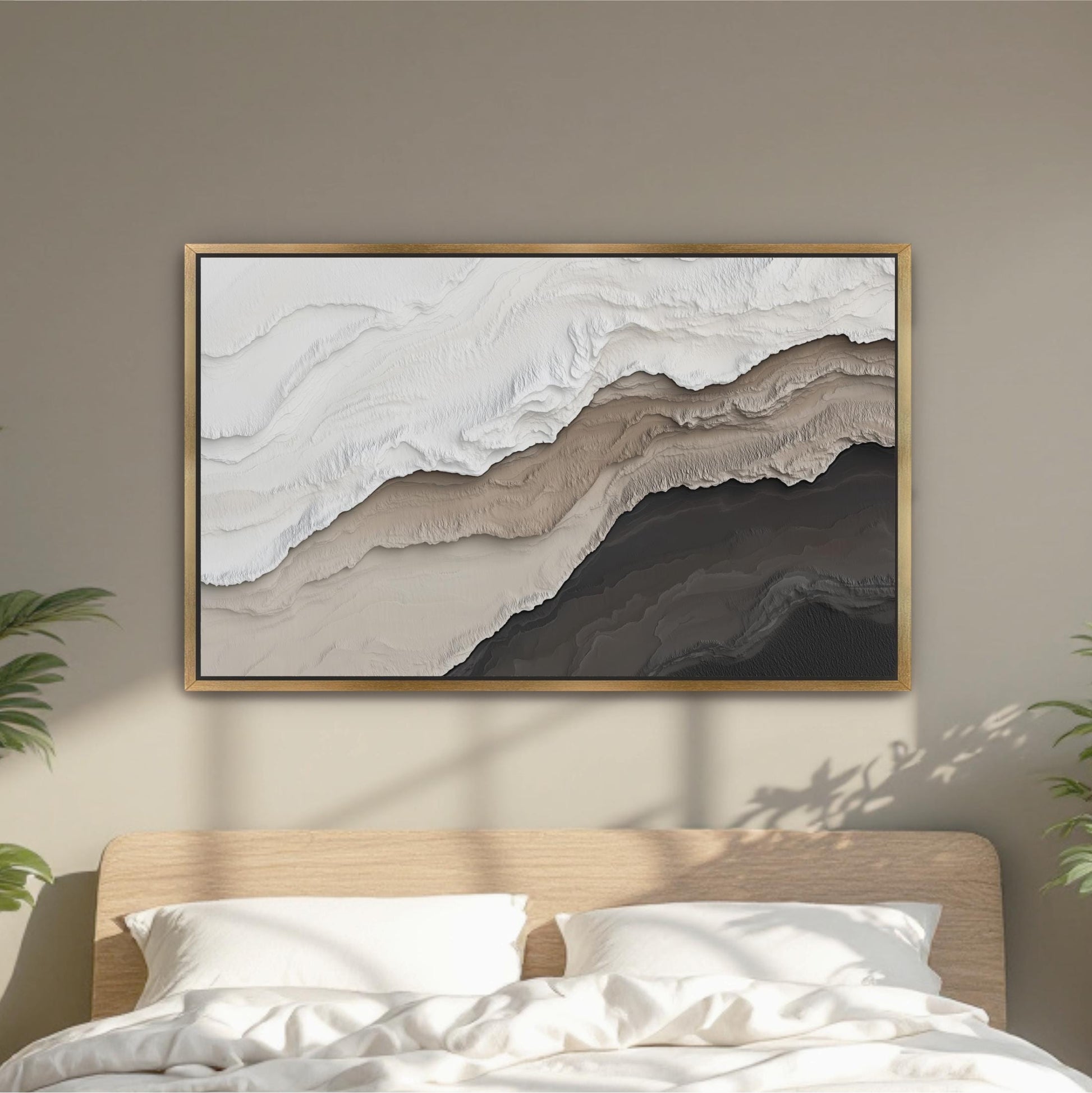 a large abstract painting hanging on a wall above a bed with white pillows.